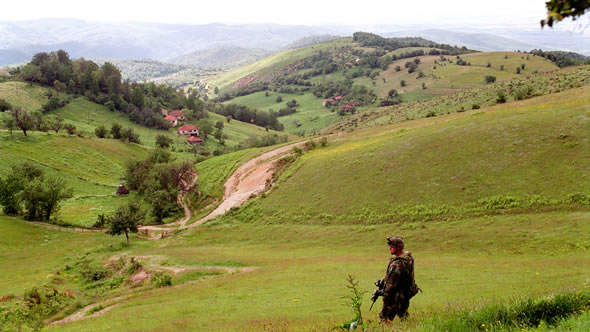 US soldier patrolling Kosovo's border. Photo: US Department of Defence/ R. D. Ward