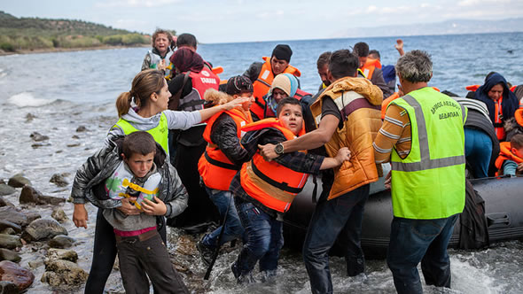 Refugees arriving in Greece. Photo: flickr/Ben White/CAFOD