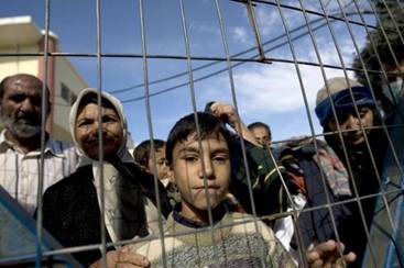 Migrants being held in the Pagani detention center on the Greek island of Lesvos