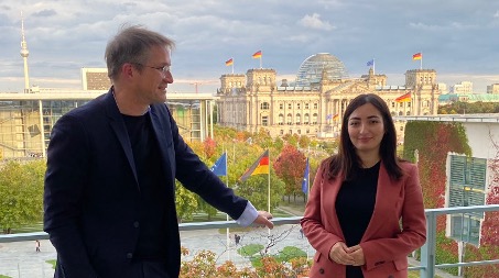Gerald Knaus with Reem Alabi-Radovan, State Minister for Migration