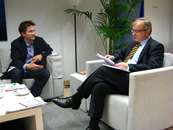 Gerald Knaus and Olli Rehn (reading ESI report)